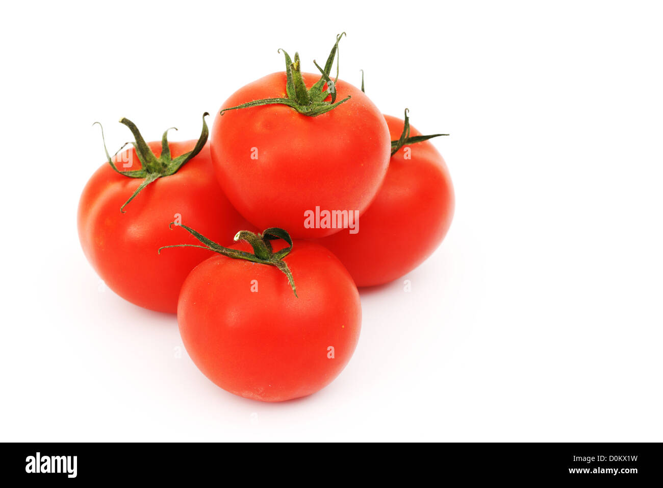 tomato pile isolated on white Stock Photo - Alamy