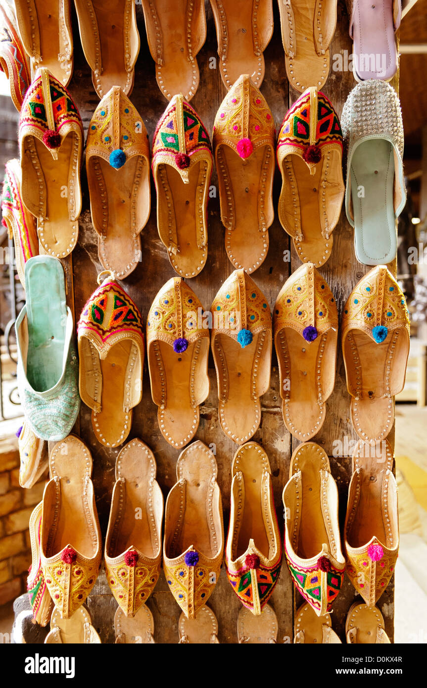 Moroccan-style slippers displayed outside a stall in The Stables Market in Camden. Stock Photo