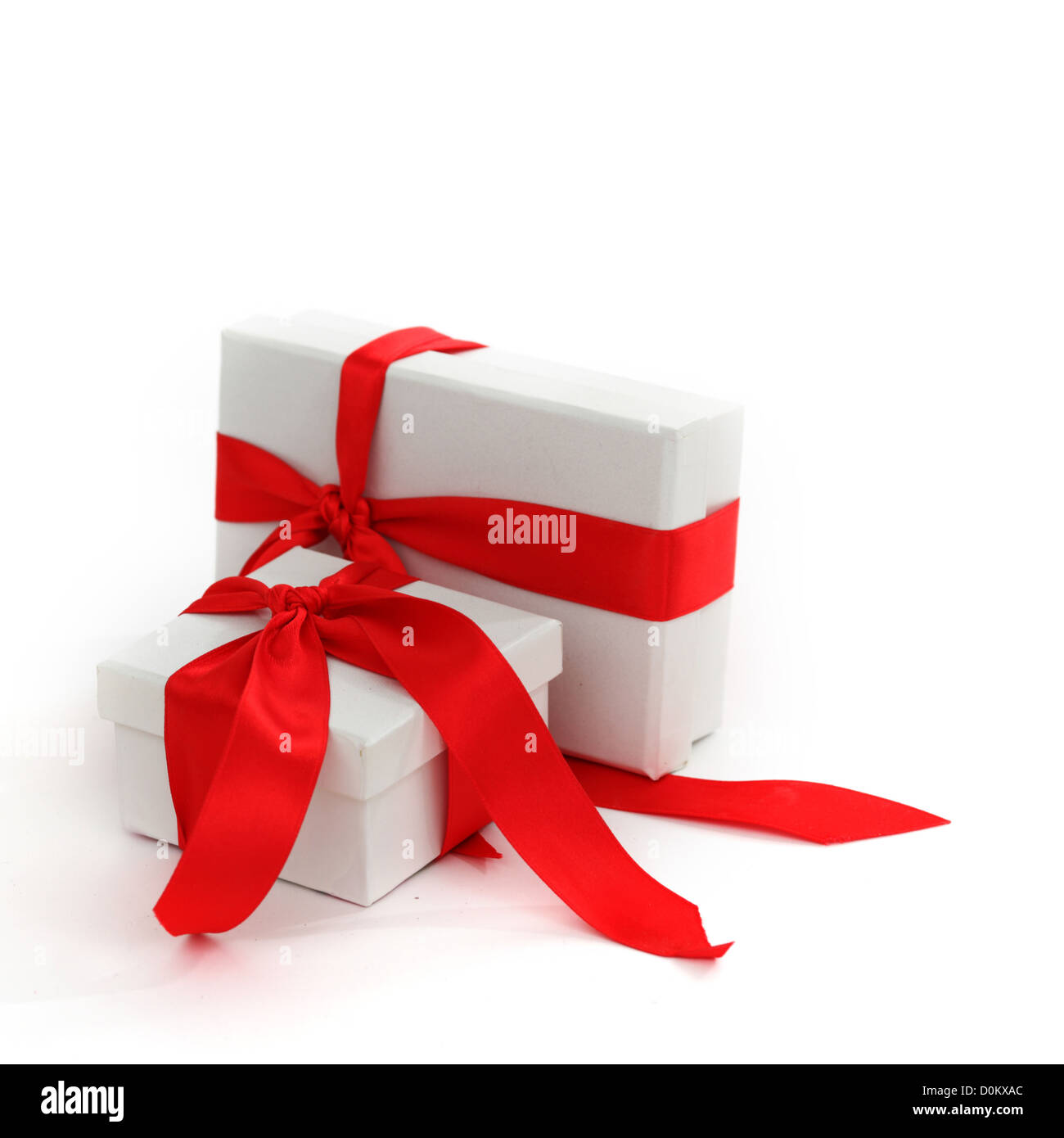 white christmas gift with red ribbon Stock Photo Alamy