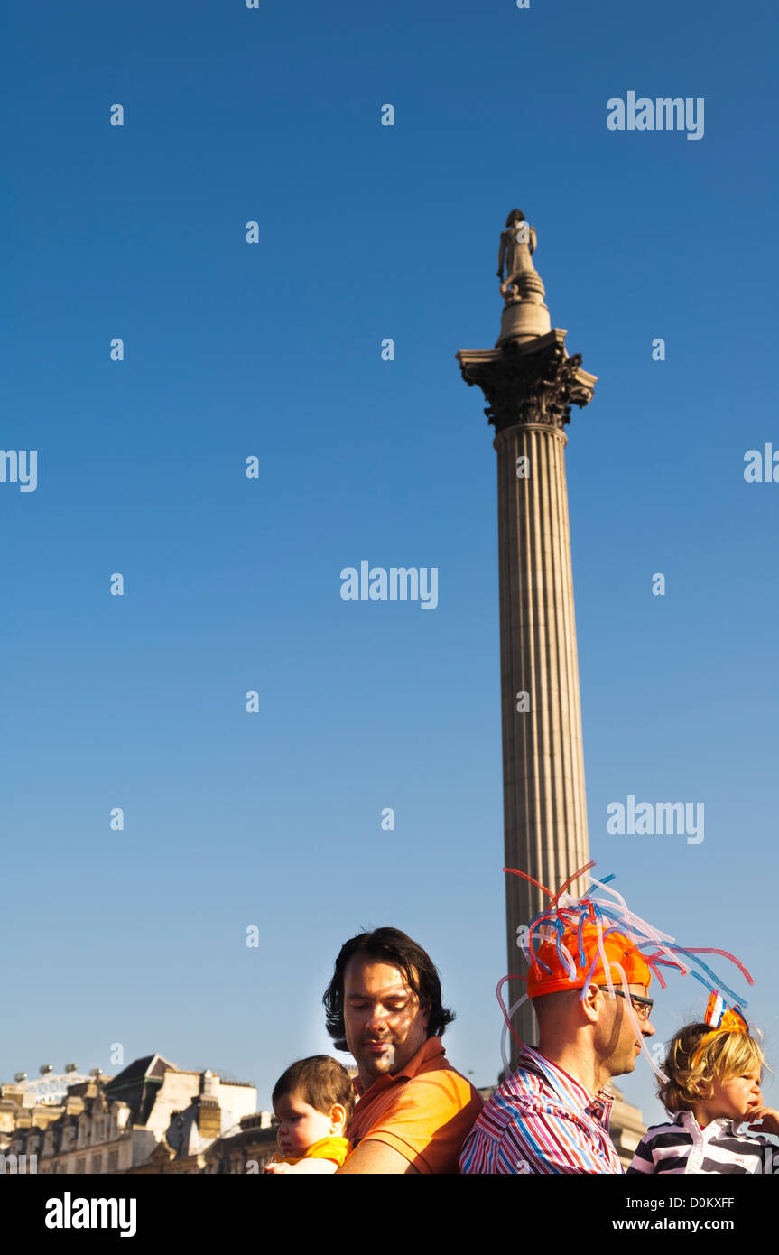 People in front of Nelson's Column in Trafalgar Square as part of a ...