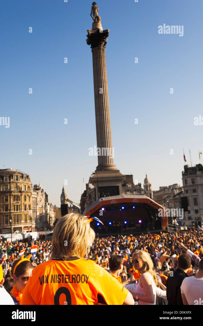 People in front of Nelson's Column in Trafalgar Square as part of a ...