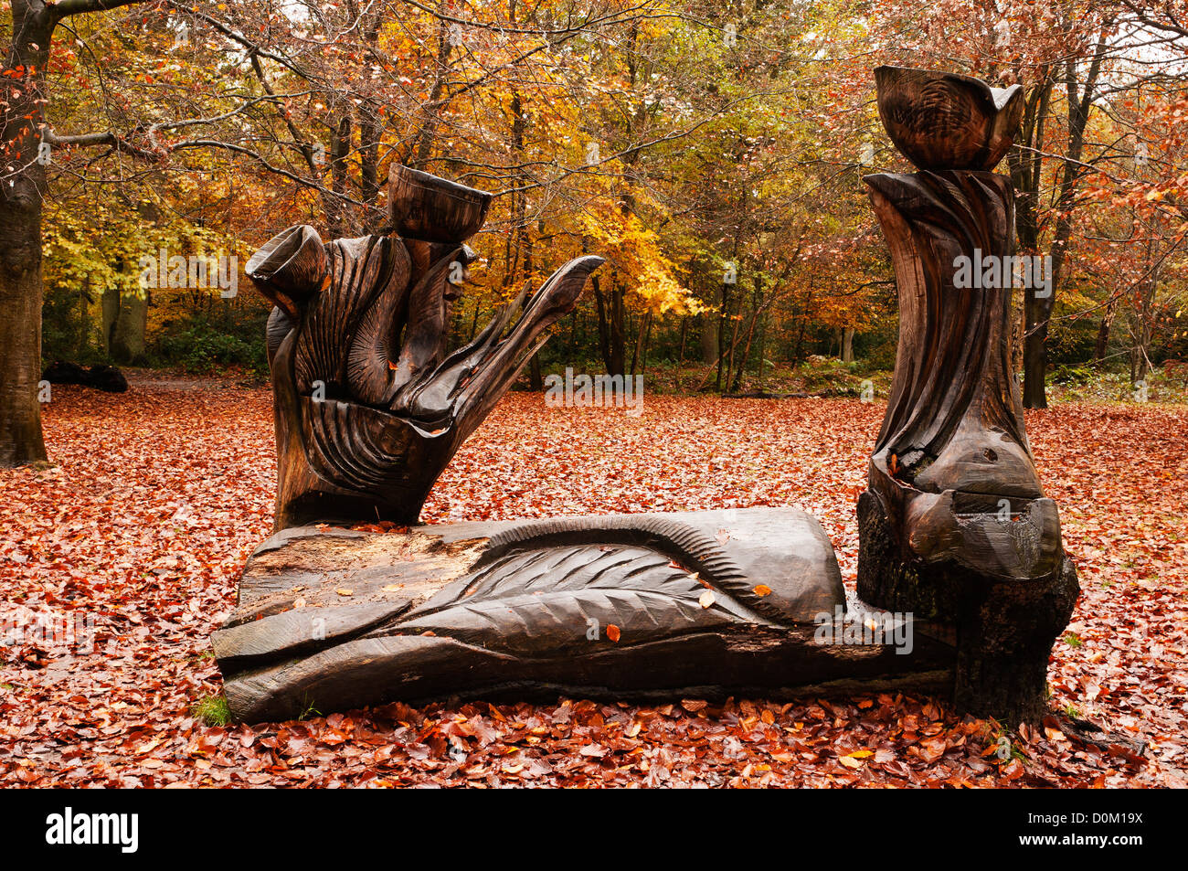 Wood carving sculpture Burnham Beeches Buckinghamshire England Stock