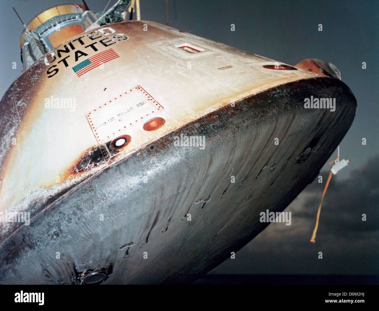 Apollo command module AS201 hoisted aboard USS Boxer during recovery unmanned suborbital mission. AS-201 was successful Stock Photo