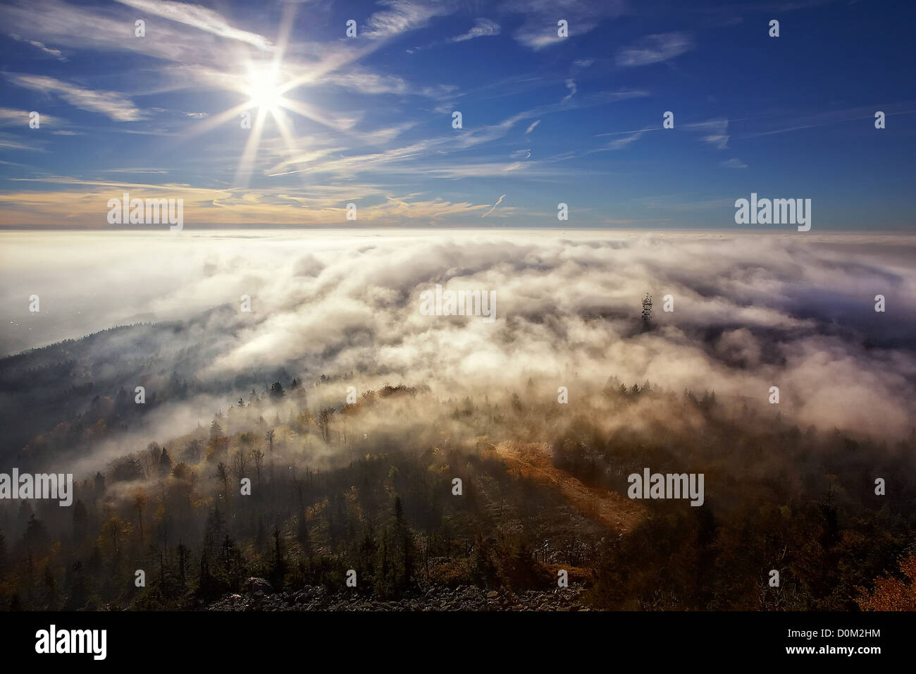 view on the sun over inversion from Jested, Jested-Kozakov ridge, Czech Republic Stock Photo