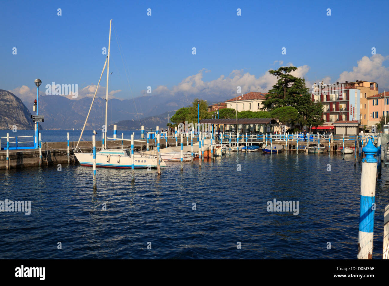 Boats in the harbour on Lake Iseo near Bergamo, Lombardy, Italy, Europe. Stock Photo
