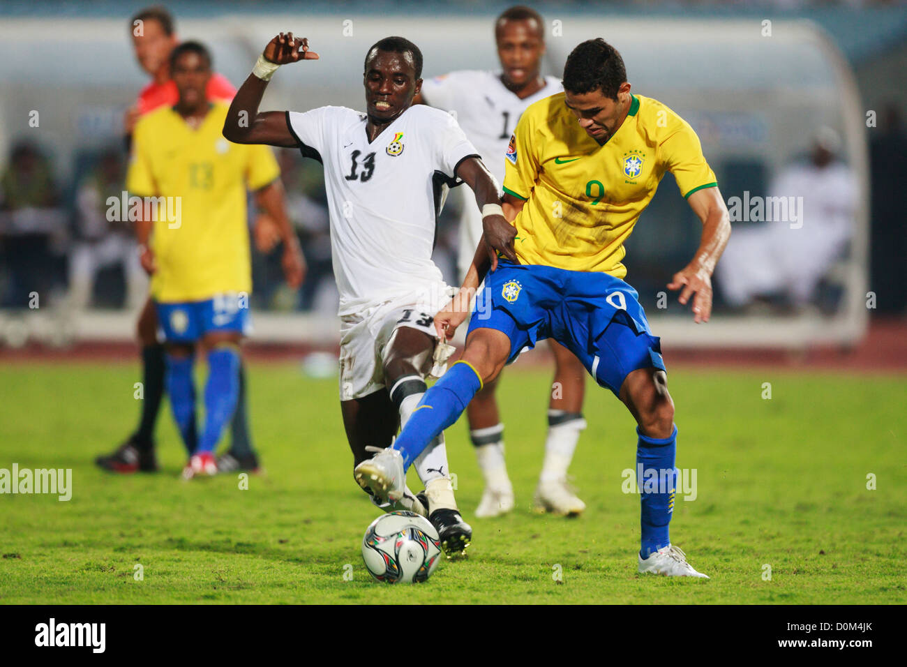 Mohammed Rabiu of Ghana (13) fights for the ball against Alan Kardec of Brazil (9) during the 2009 FIFA U-20 World Cup final. Stock Photo