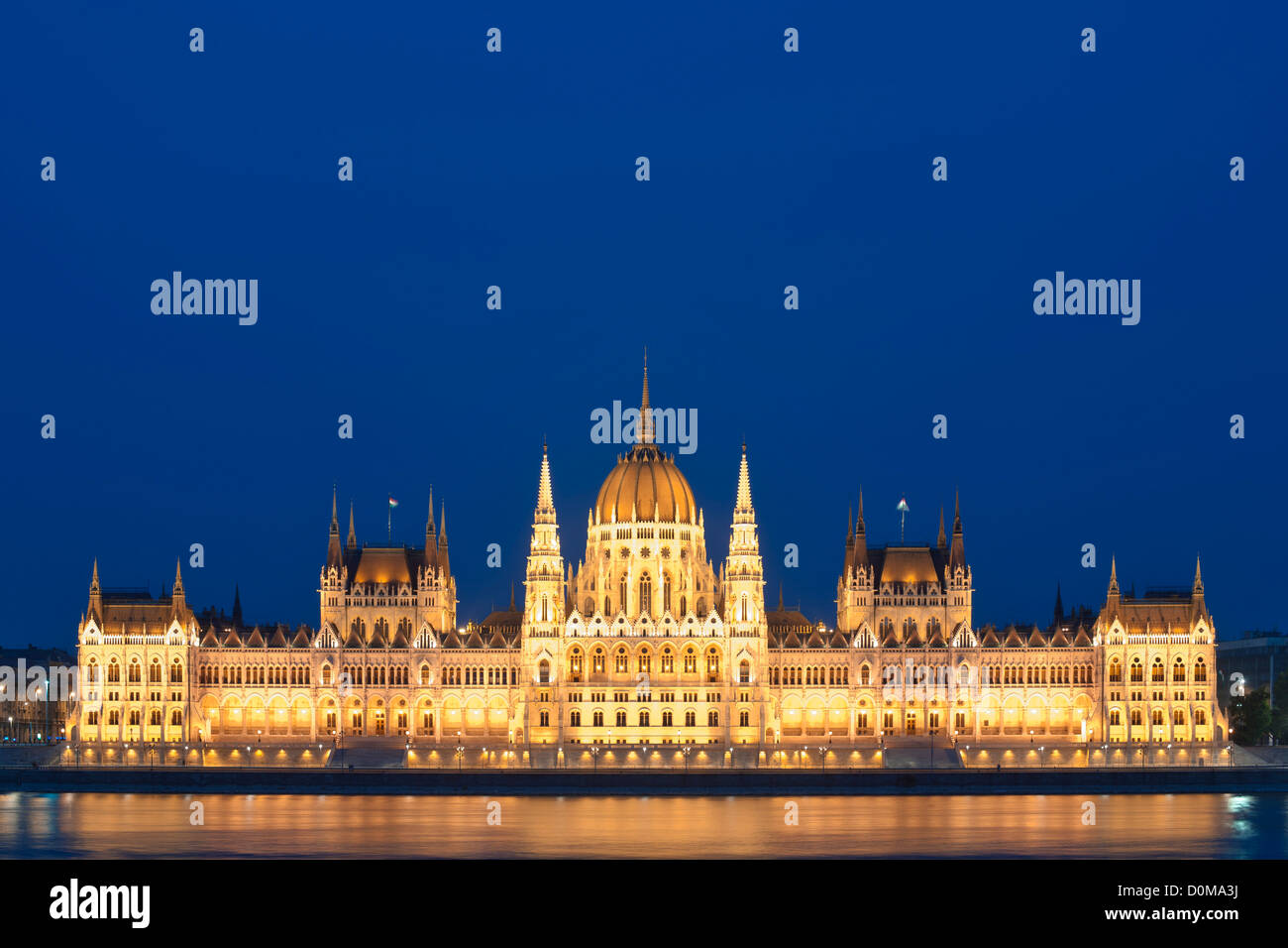 Night view of the Hungarian Parliament Building on the banks of the Danube River in Budapest, the capital of Hungary. Stock Photo