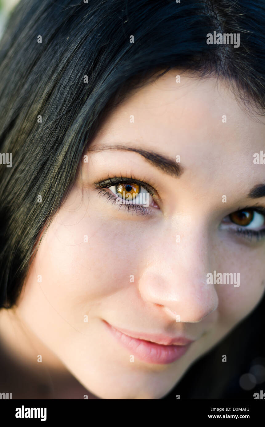 Close up portrait of attractive woman with brown eyes Stock Photo