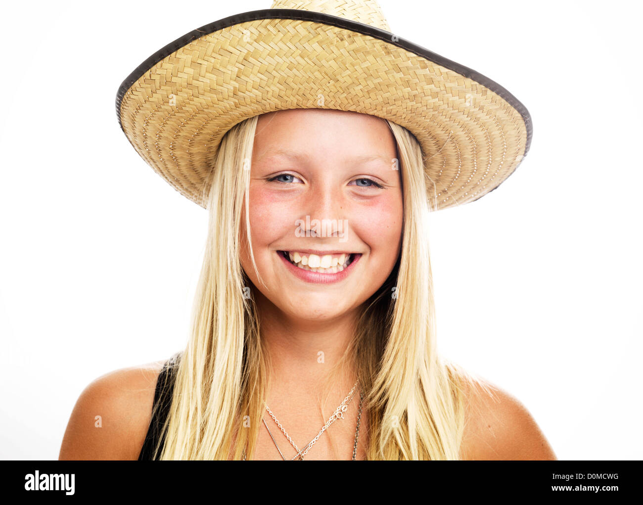 Portrait of smiling girl wearing straw hat, studio shot Stock Photo - Alamy