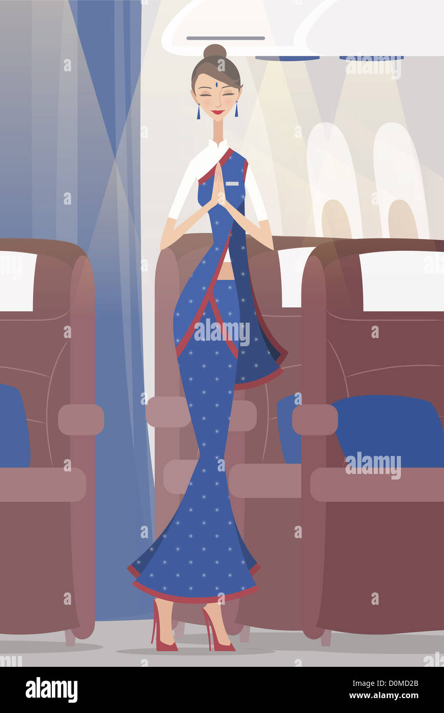 Indian air hostess greeting in an airplane Stock Photo
