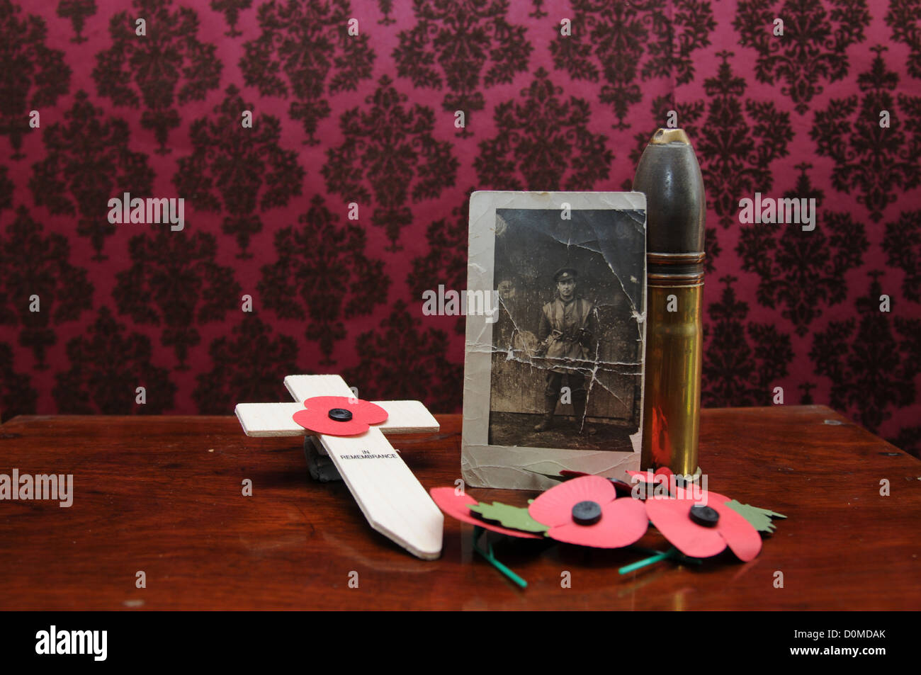 Tribute for Remembrance Day showing poppies and photograph of WW1 veteran Stock Photo
