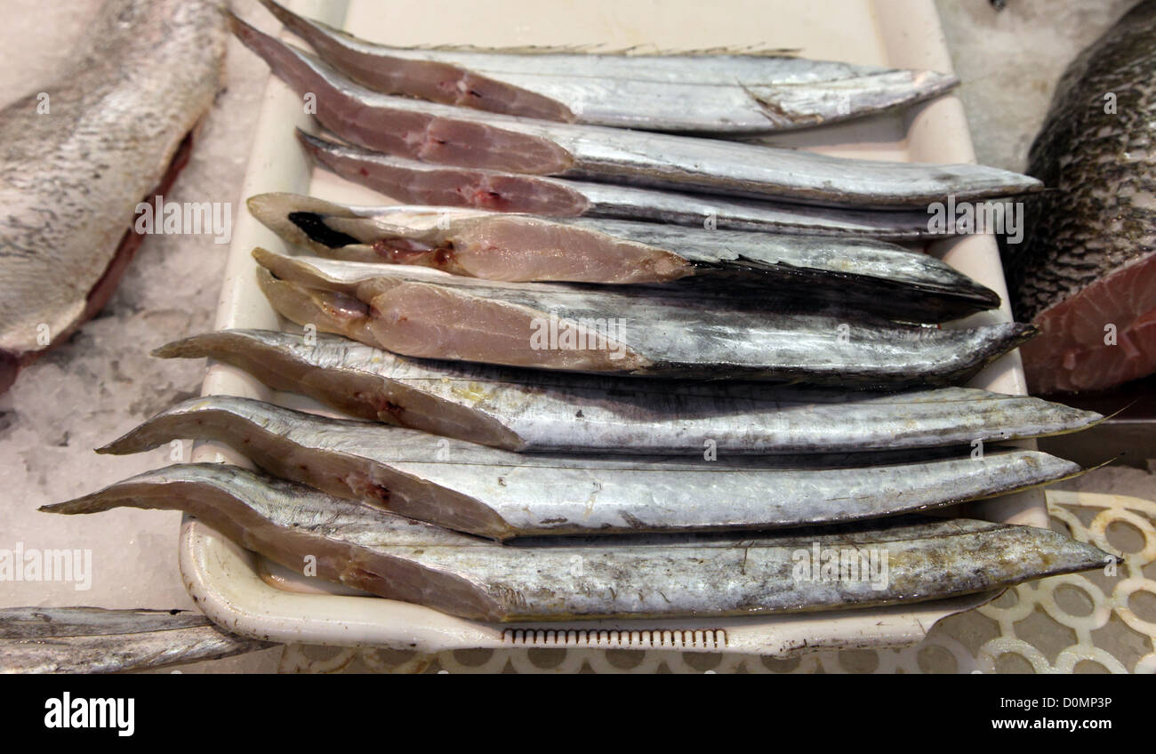 Sliced Portuguese Scabbard (Espada) on sale in Lisbon fish market Stock Photo