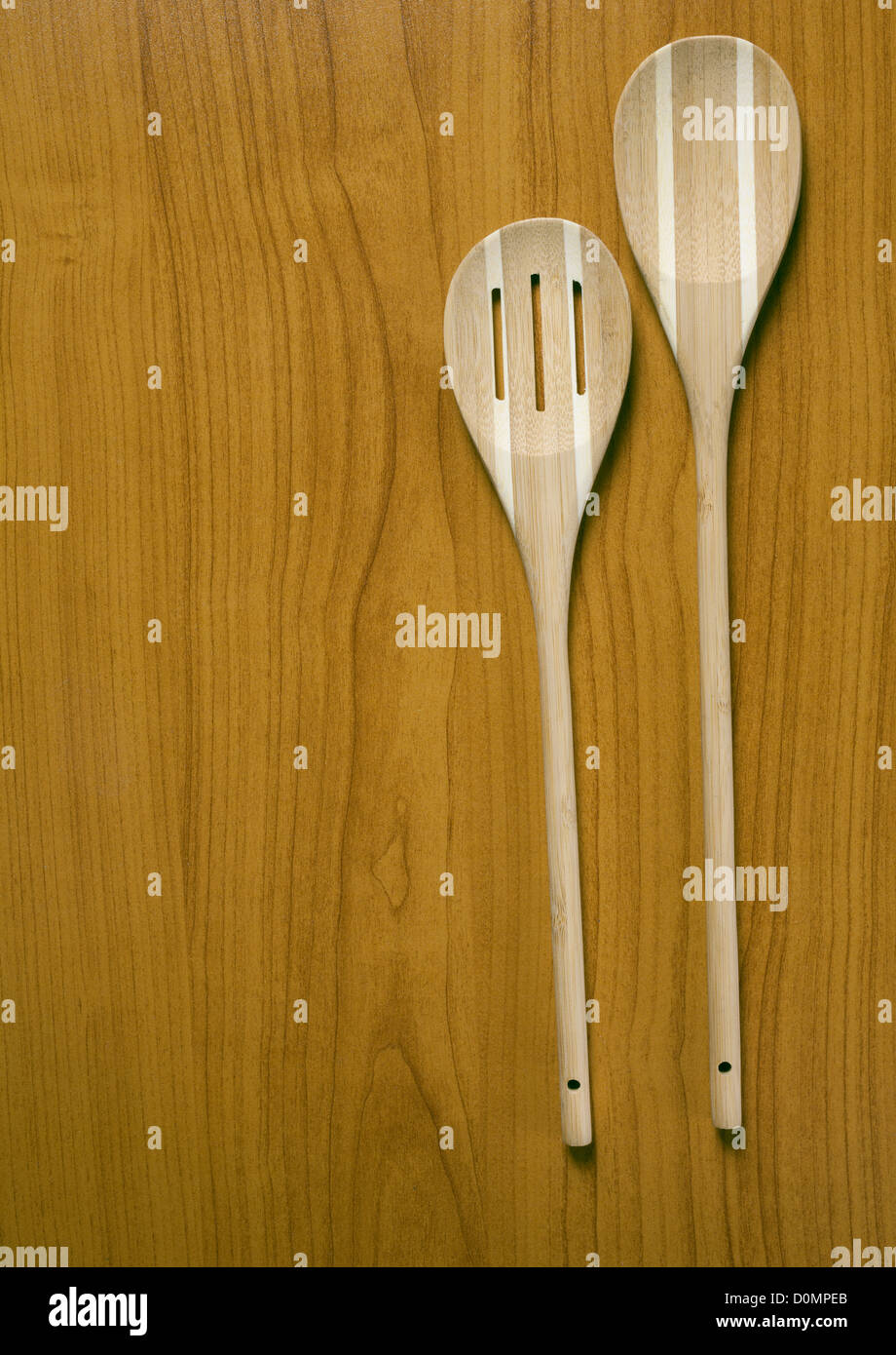 new wooden spoon on kitchen background, selective focus Stock Photo