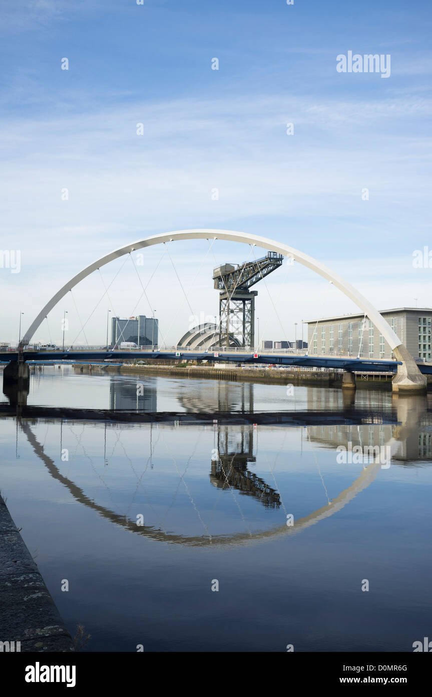 View along river Clyde towards the Arc Bridge or Squinty Bridge as it is known locally towards the  SECC in Glasgow Stock Photo