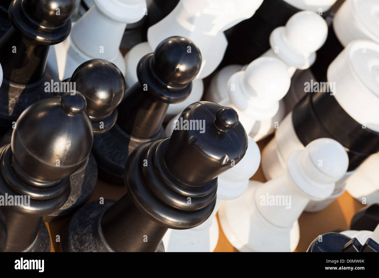 Black and white chessmen on board cruise ship. Cunard's Queen Victoria. Stock Photo