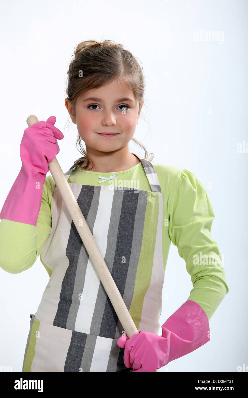 cute little girl dressed as a cleaning lady Stock Photo Alamy