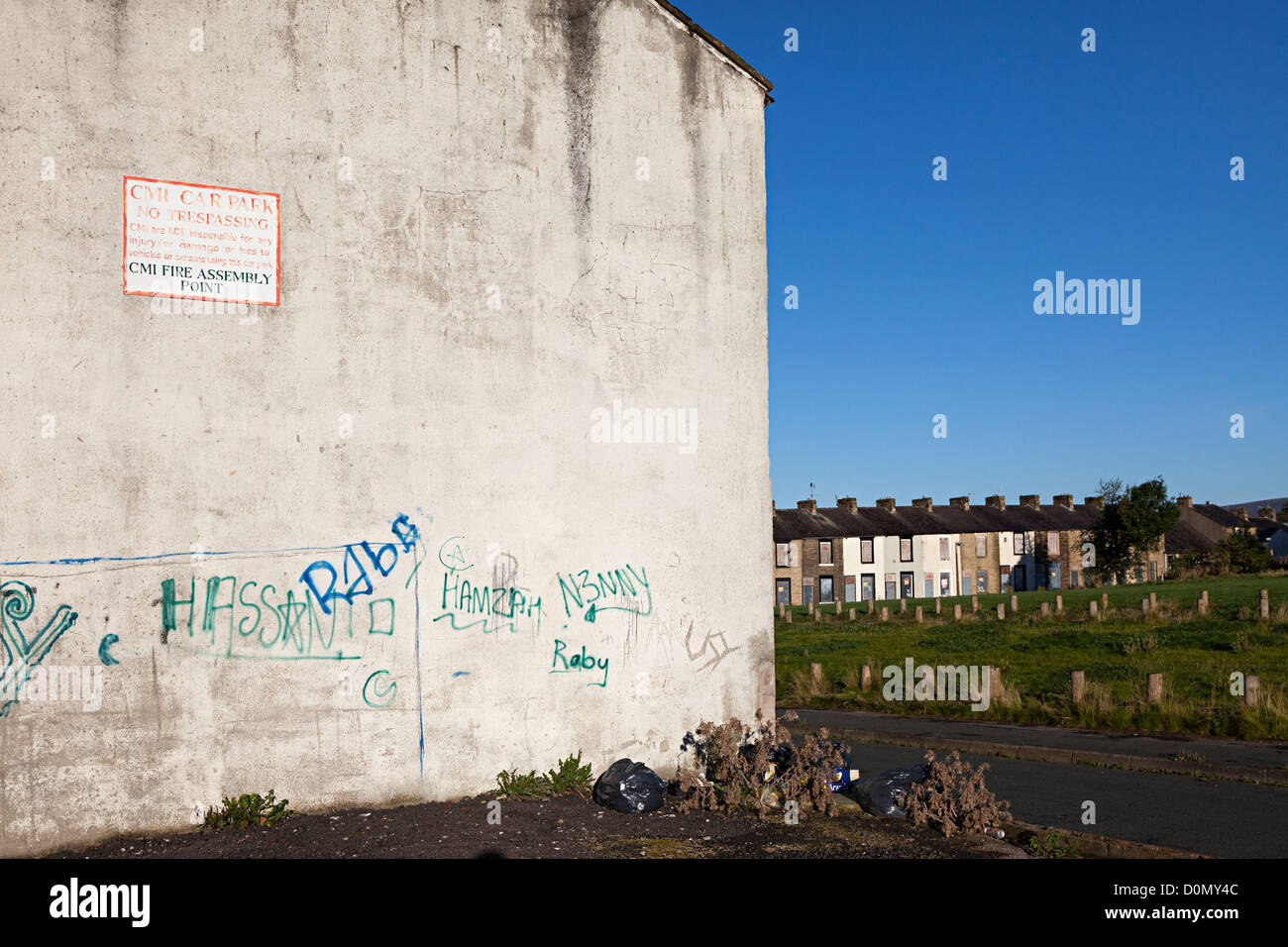 Derelict terraced houses boarded up and awaiting demolition, Burnley