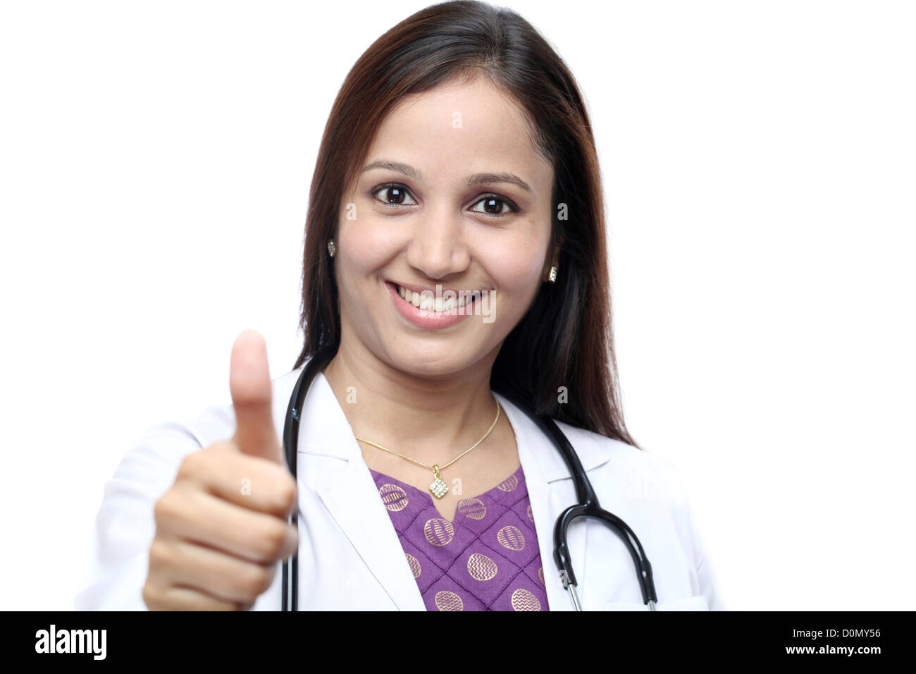 Smiling Indian female doctor with thumbs up gesture Stock Photo - Alamy