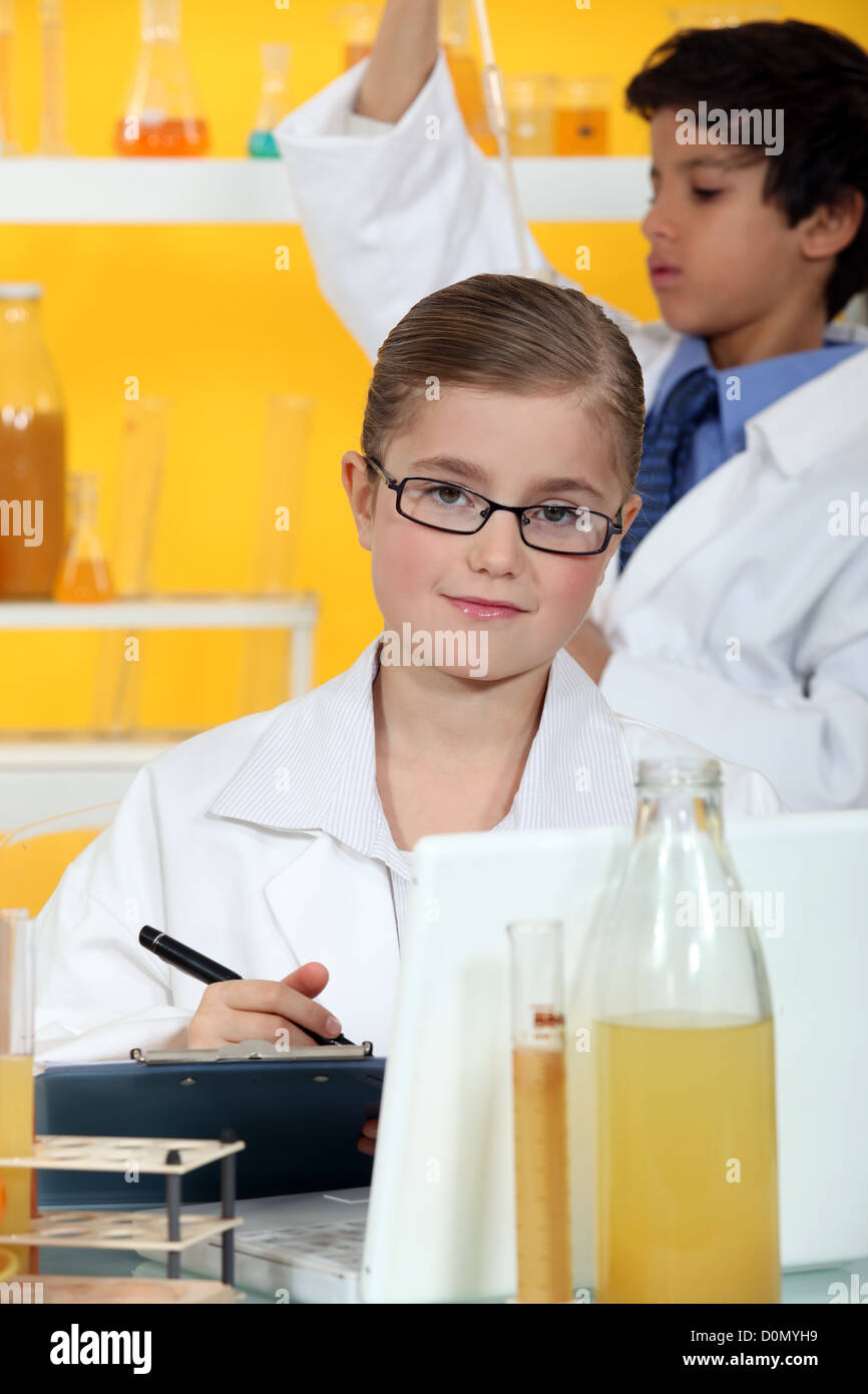 Two children conducting a science experiment Stock Photo Alamy
