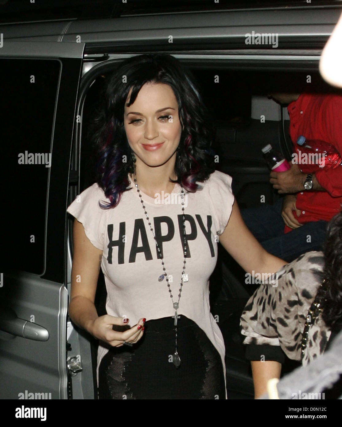 Katy Perry arriving back to her hotel wearing a 'HAPPY' t-shirt London