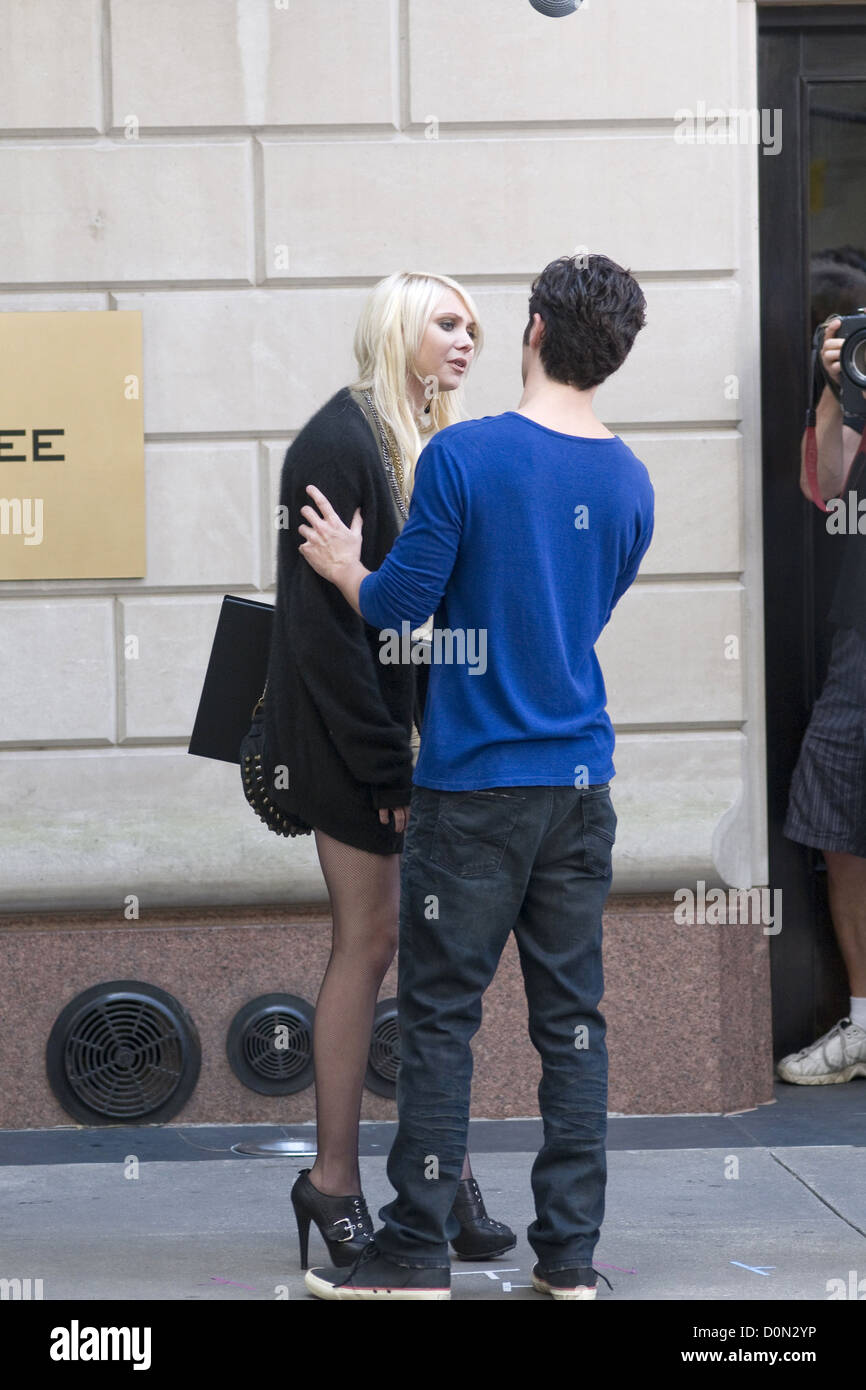 Taylor Momsen and Penn Badgley on the film set of 'Gossip Girl' on location at the Upper East Side. New York City, USA - Stock Photo