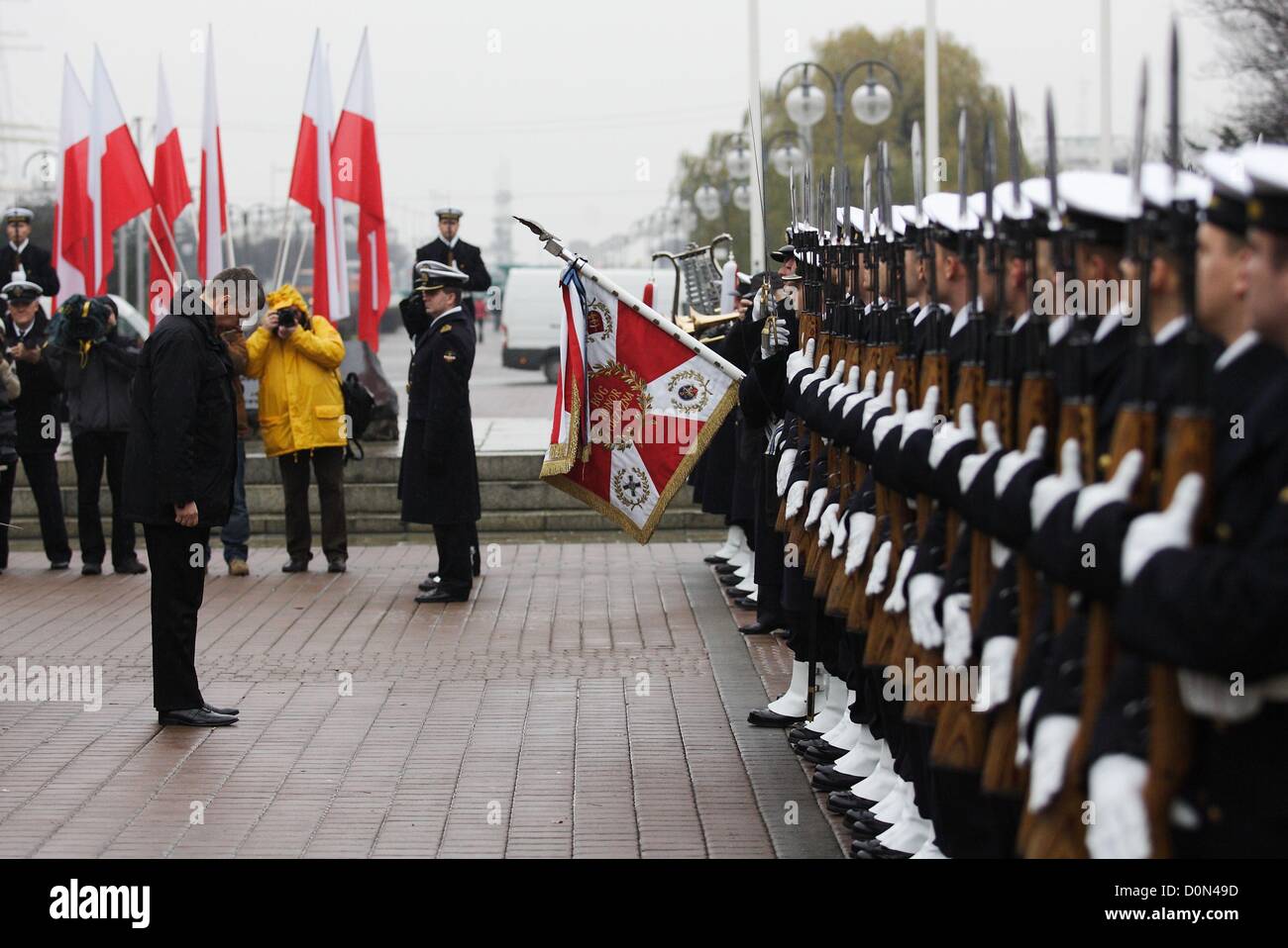 Gdynia, Poland 28th, November 2012  94th anniversary of Polish Navy reneval by the Marshal Jozef Pilsudski in 1918. Minister of Defence Tomasz Siemoniak (C) takes part in the ceremony in front of Polish Navy Sailor Plaque in Gdynia. Stock Photo