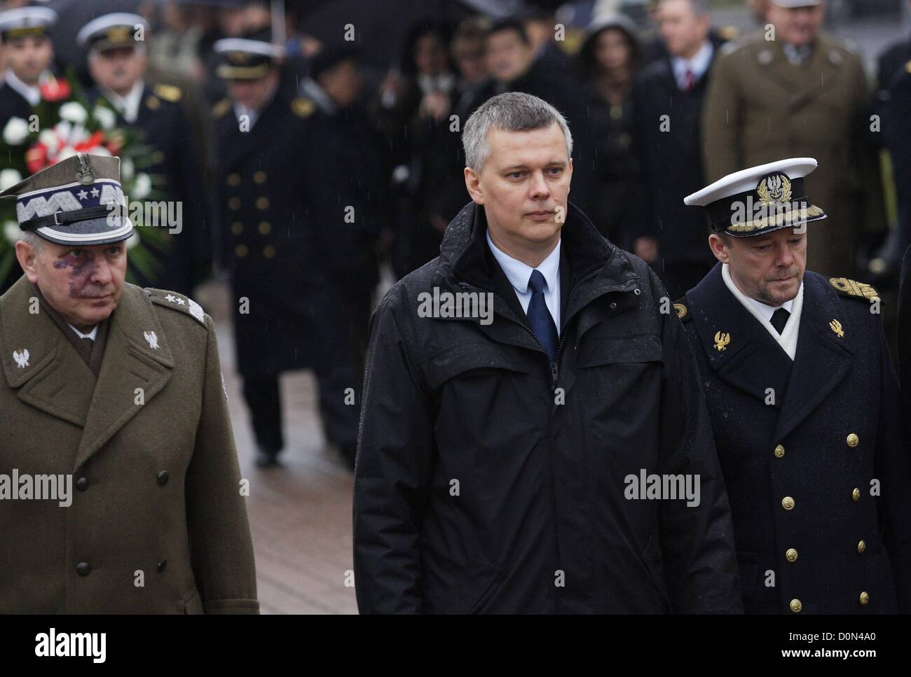 Gdynia, Poland 28th, November 2012  94th anniversary of Polish Navy reneval by the Marshal Jozef Pilsudski in 1918. Minister of Defence Tomasz Siemoniak (C) takes part in the ceremony in front of Polish Navy Sailor Plaque in Gdynia. Stock Photo