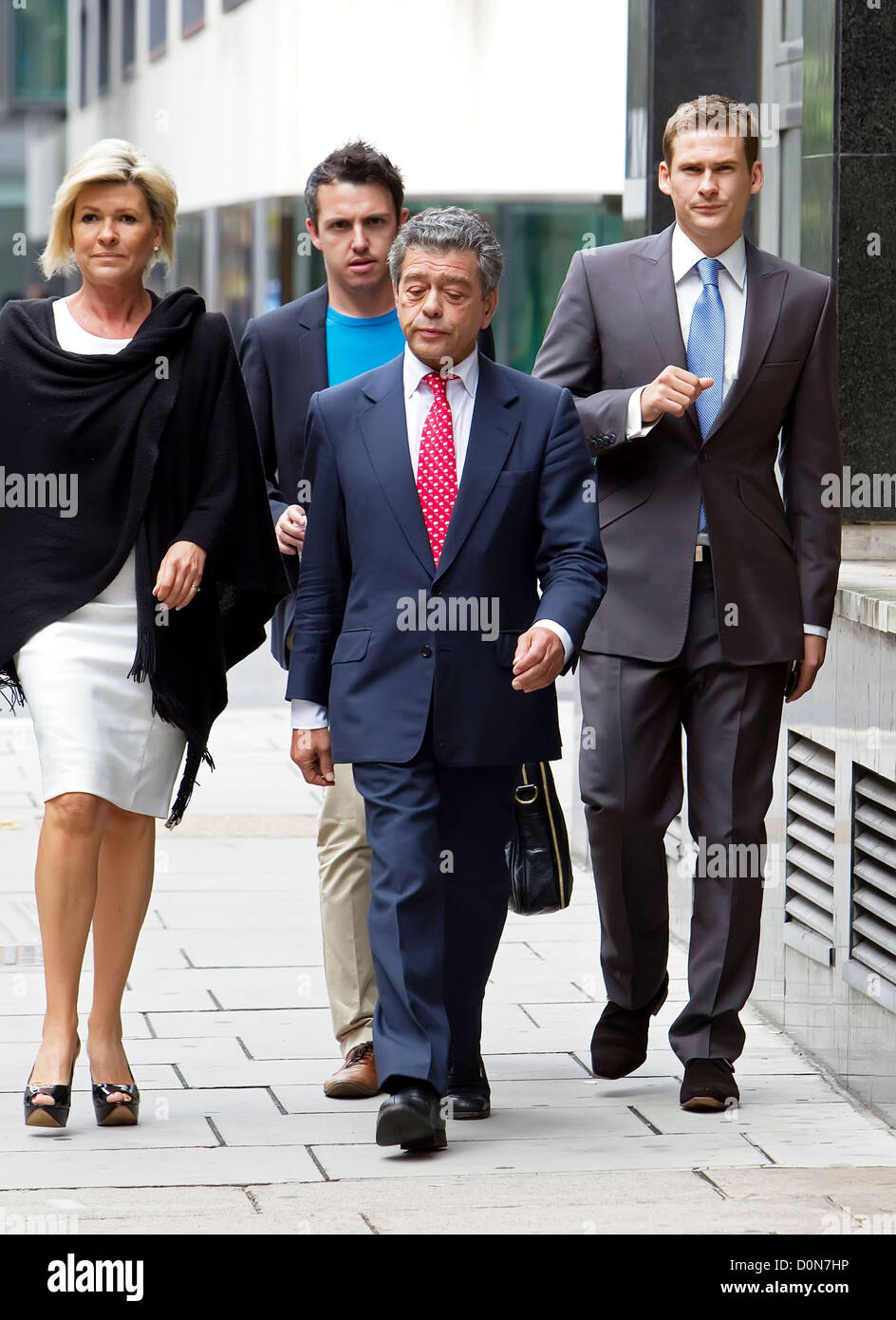 Lee Ryan accompanied by his mother, Sheila (L) and his lawyer, Raymond Lewis (C) arrive at the City of Westminster Magistrates' Stock Photo
