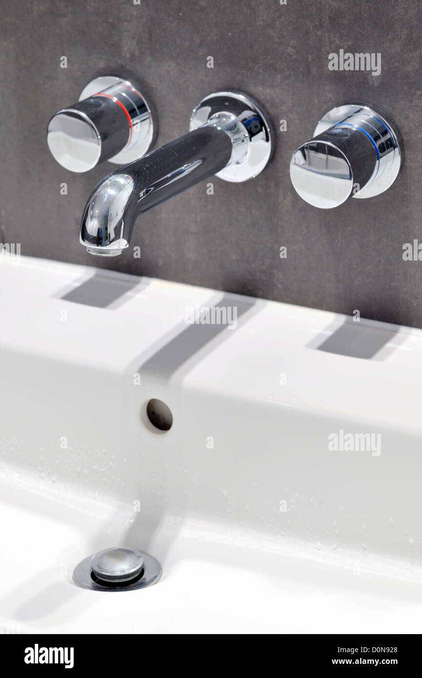 Modern stainless steel tap Stock Photo