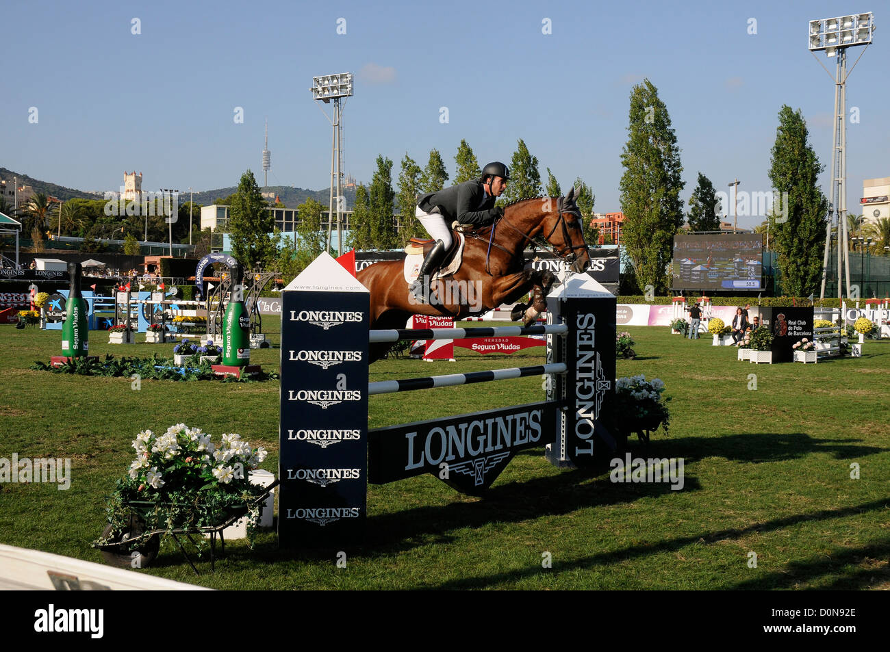 horse with rider jumping an obstacle during the CSIO, International