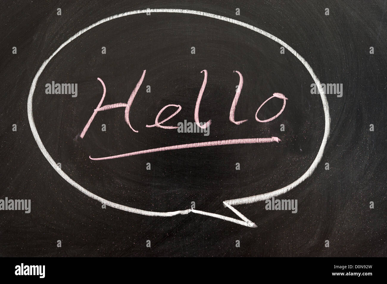 Hello word written in a bubble on chalkboard Stock Photo
