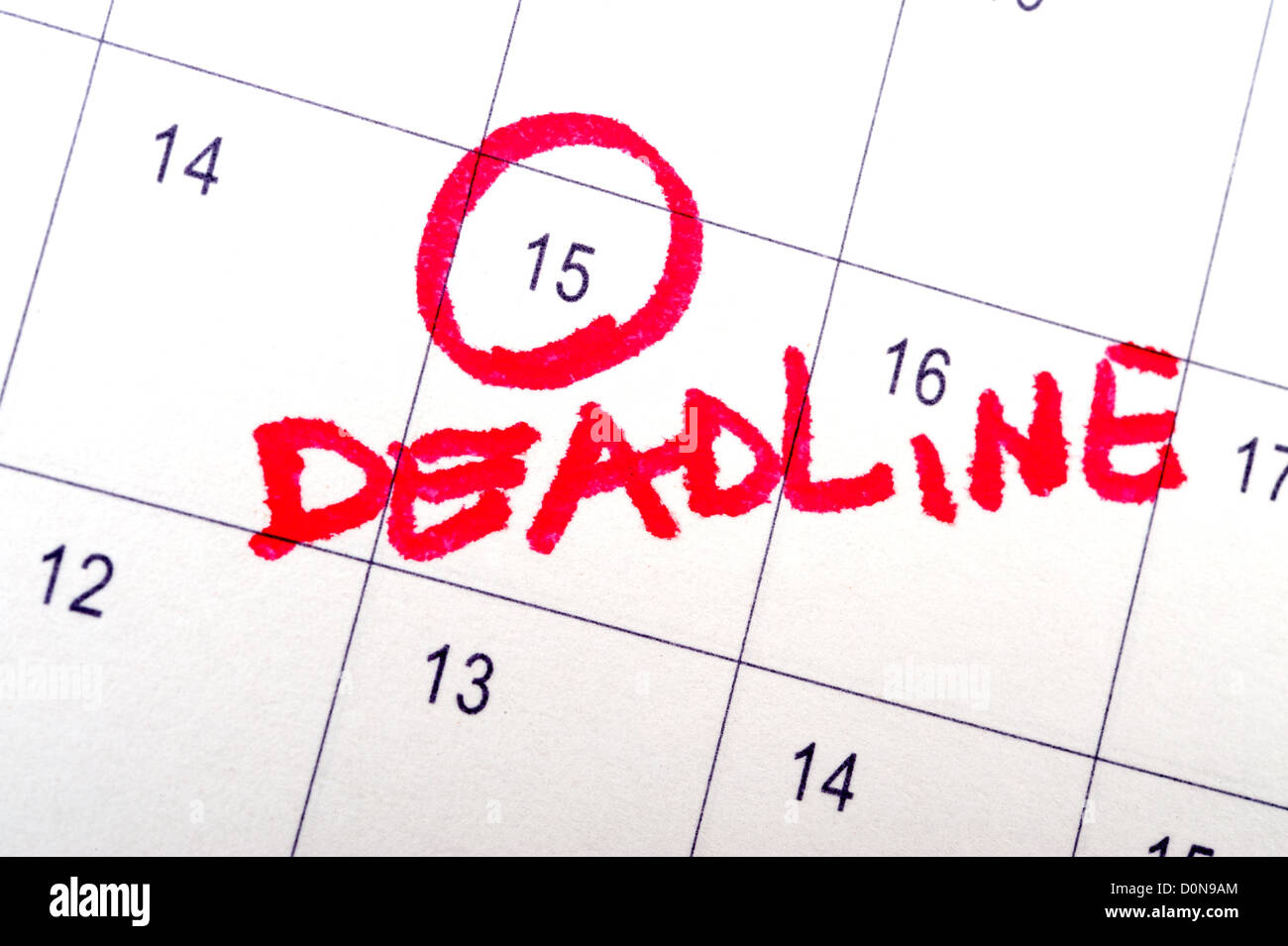 Deadline word written on the calendar Stock Photo