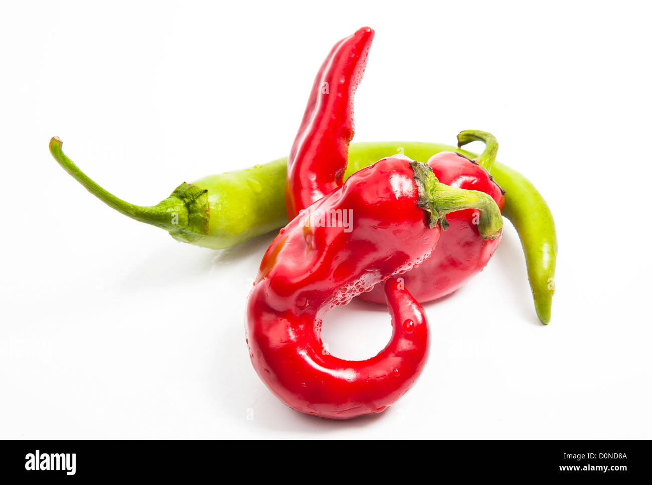 Red and green chili pepper isolated on white Stock Photo - Alamy