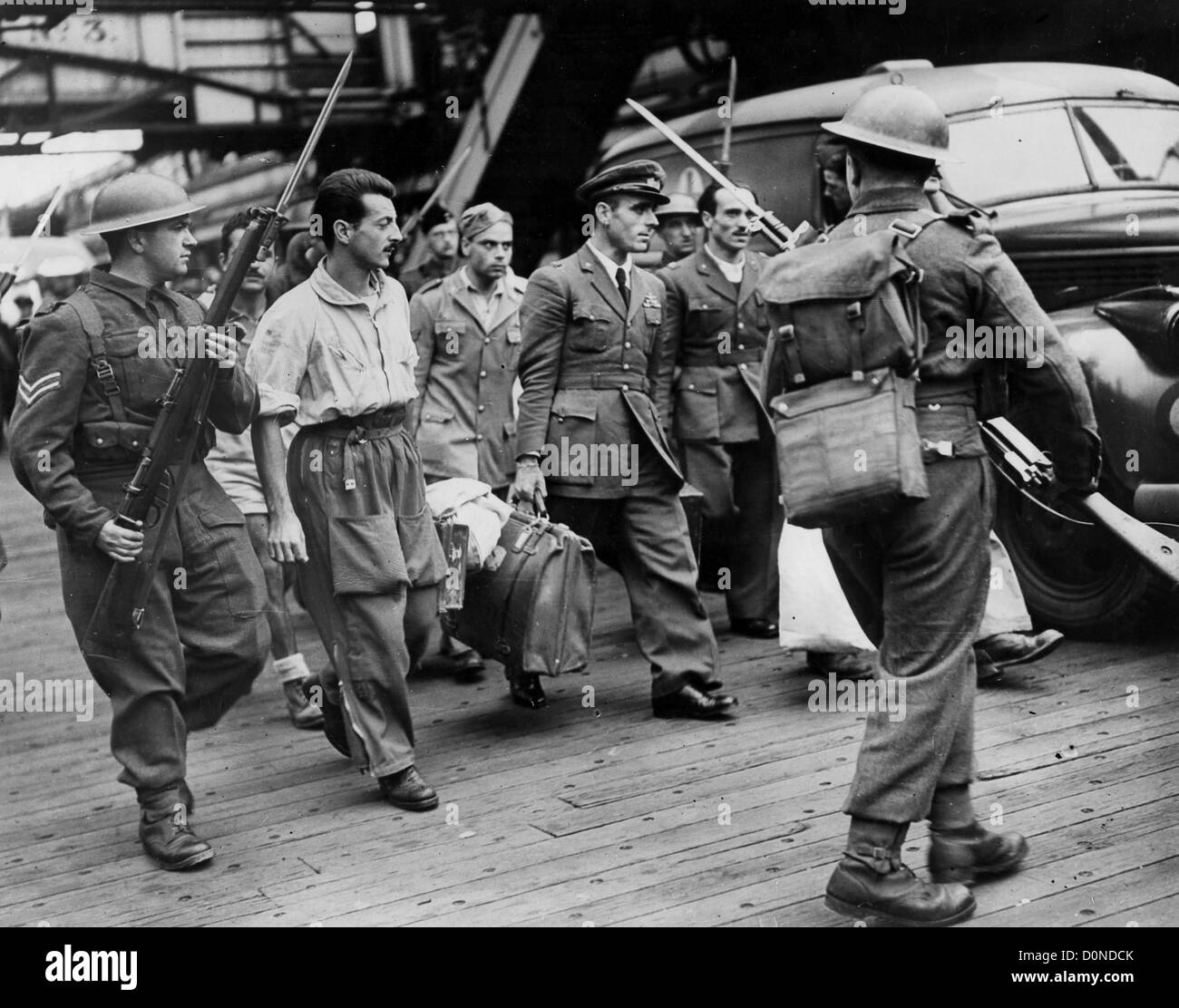 Italian prisoners of war arrive in England following capture on Malta Stock Photo