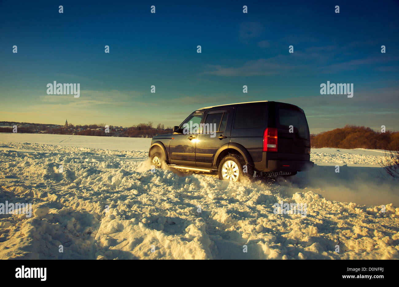 Land Rover Discovery suv on background the Russian winter. Stock Photo