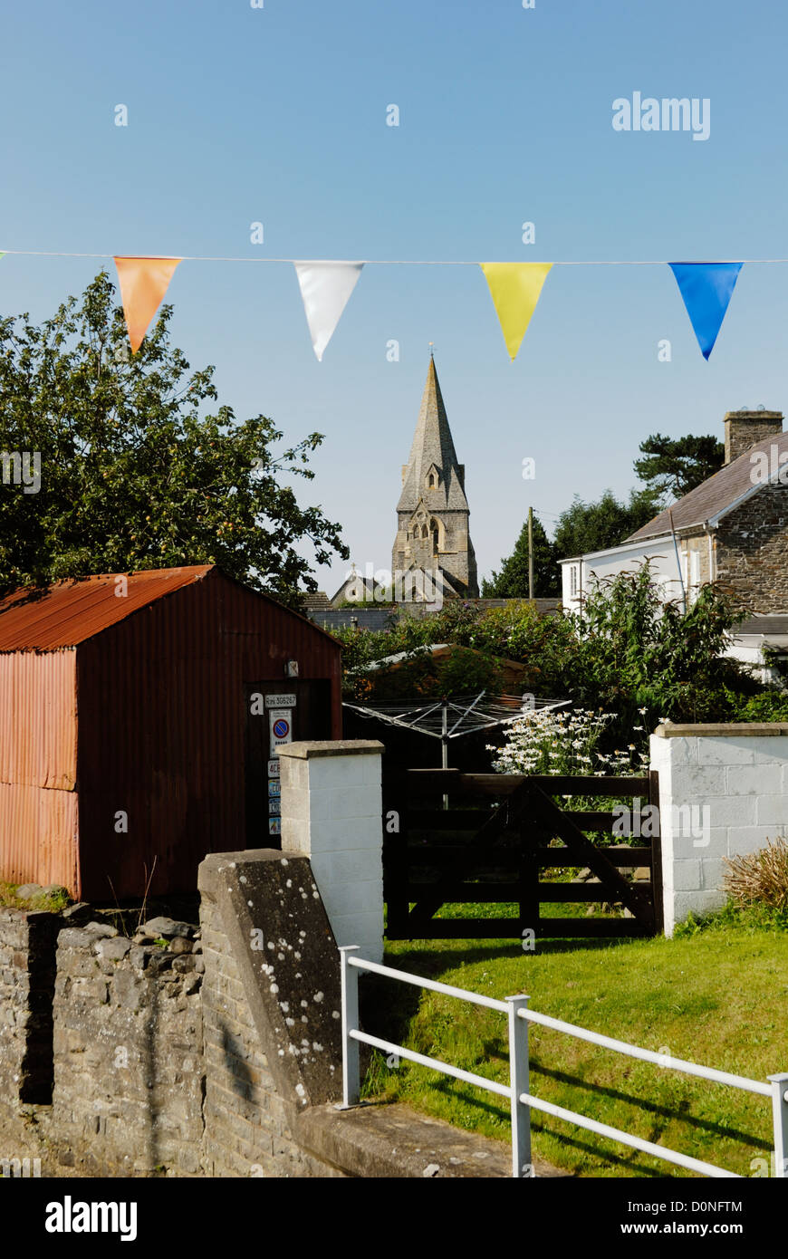 Coloured bunting in the village of Llanrhystud, Wales. Stock Photo