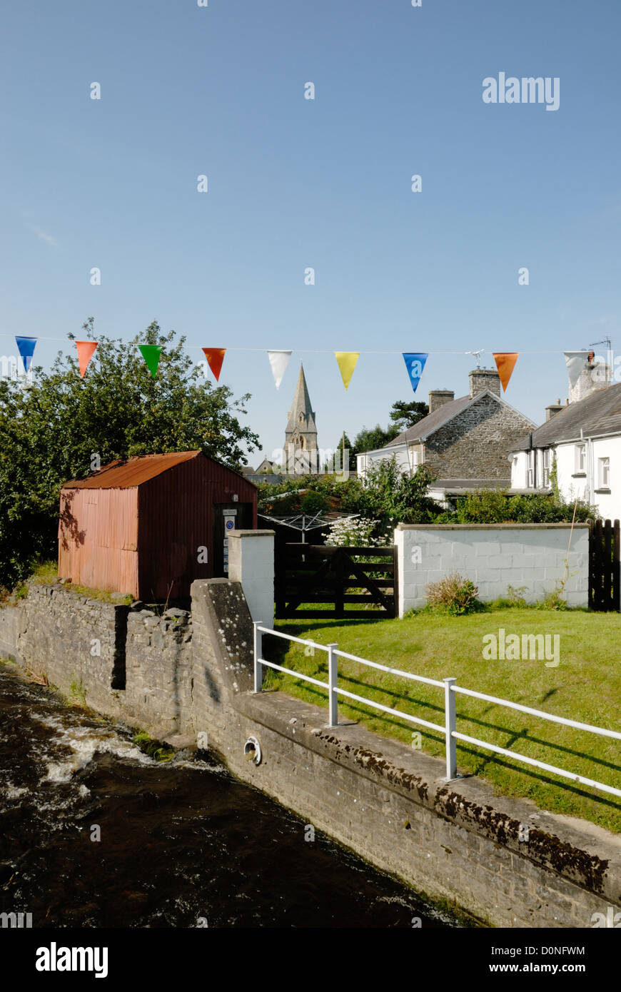 Coloured bunting in the village of Llanrhystud, Wales. Stock Photo