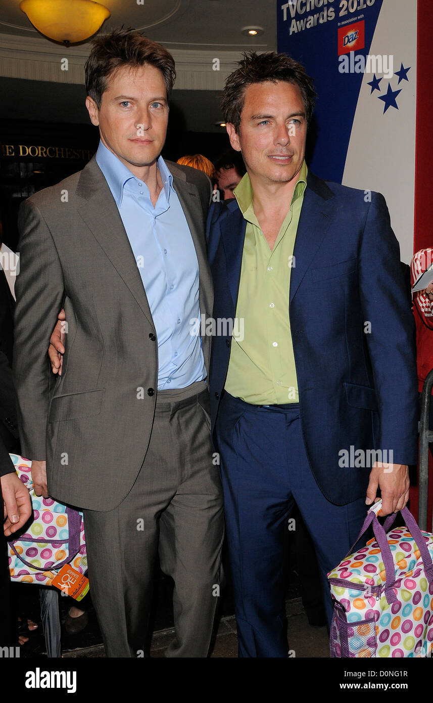 John Barrowman and husband Scott Gill leaving the TV Choice Awards held