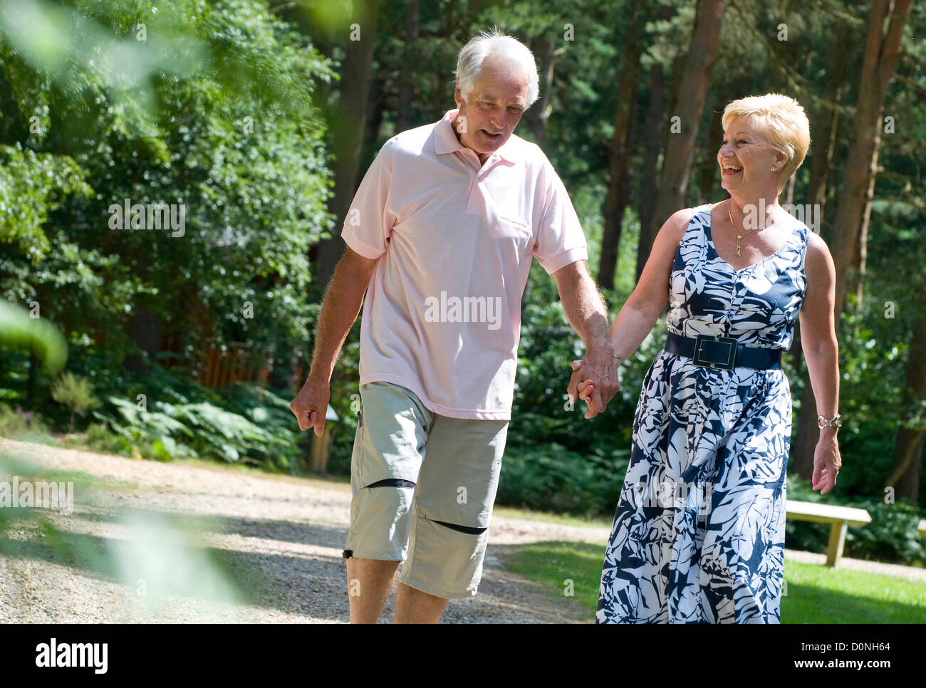 mature couple walking in countryside Stock Photo