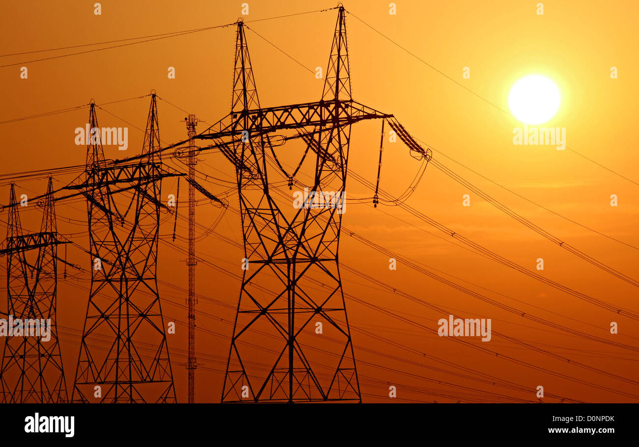 high voltage electrical tower during sunset Stock Photo - Alamy