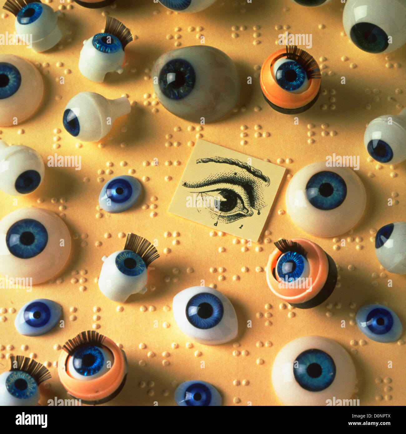 Plastic Eyeballs on a Page of Braille Stock Photo Alamy