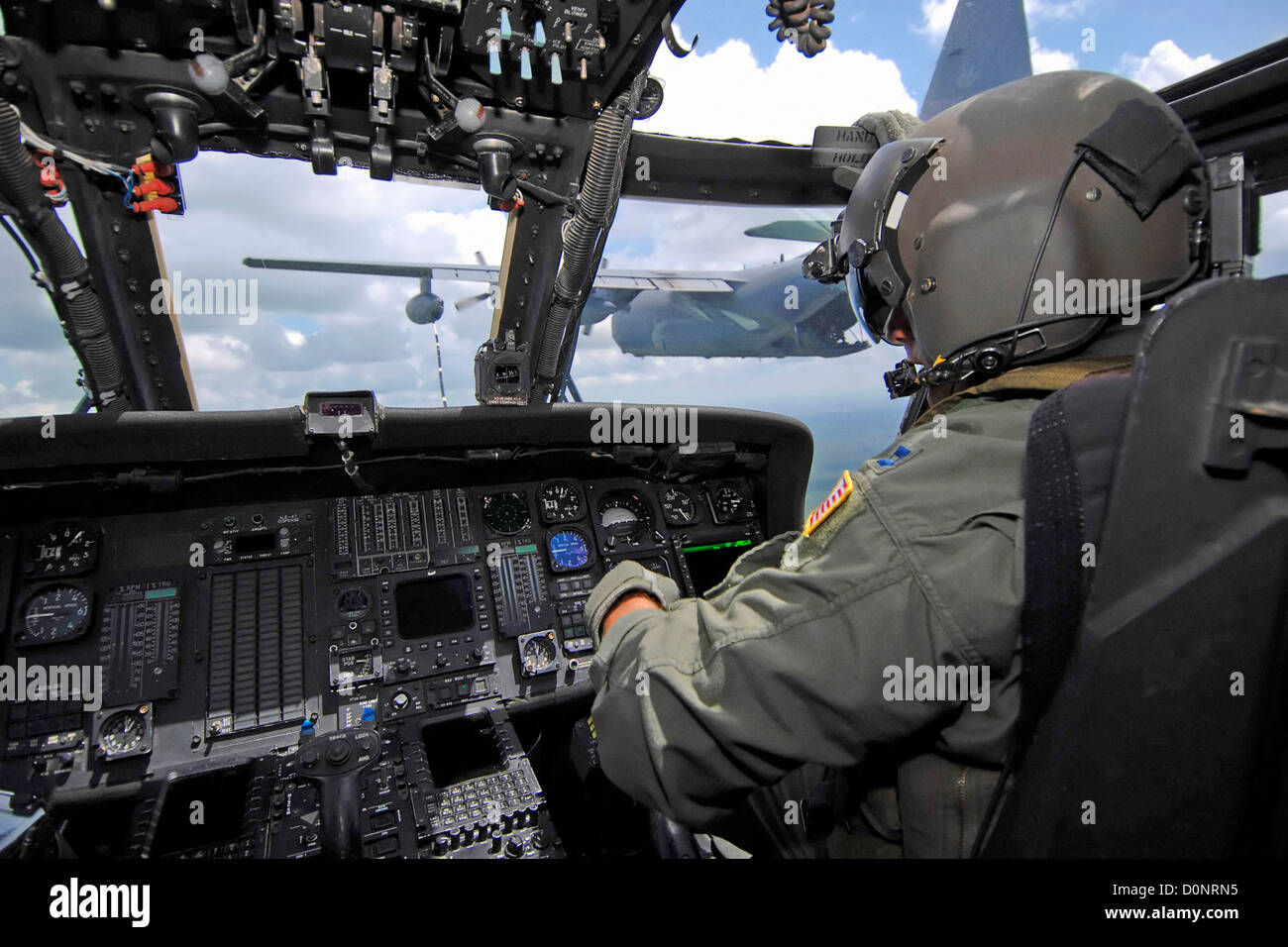Refueling Helicopter in Flight Stock Photo
