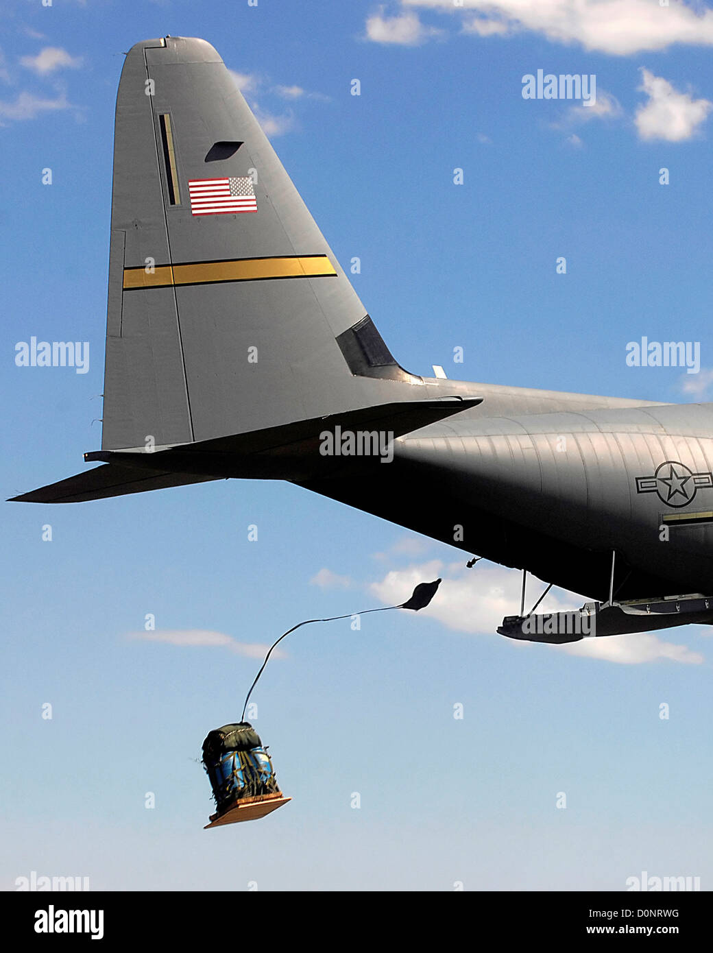 C-130 Hercules Making an Airdrop Stock Photo