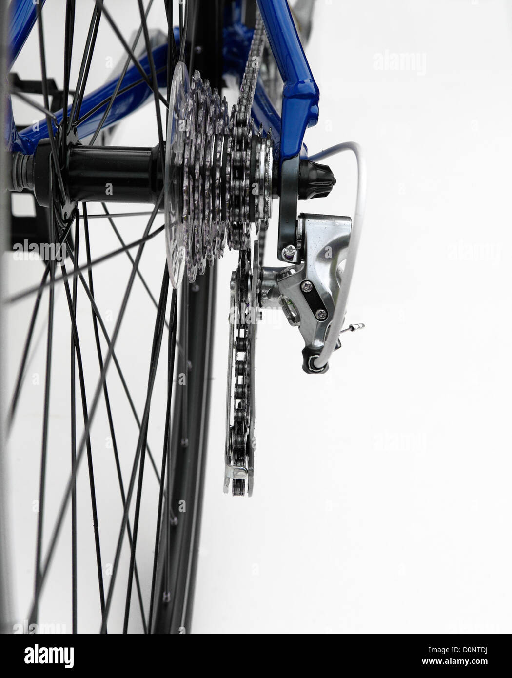 Road  racing bike bicycle rear derailleur gears sprockets chain transmission rear view from wheel hub spokes Stock Photo