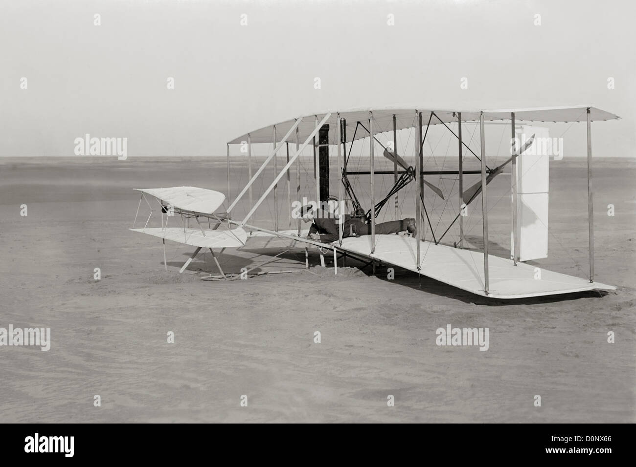 Wilbur Wright in Wright Flyer After Unsuccessful Flight Attempt Stock Photo