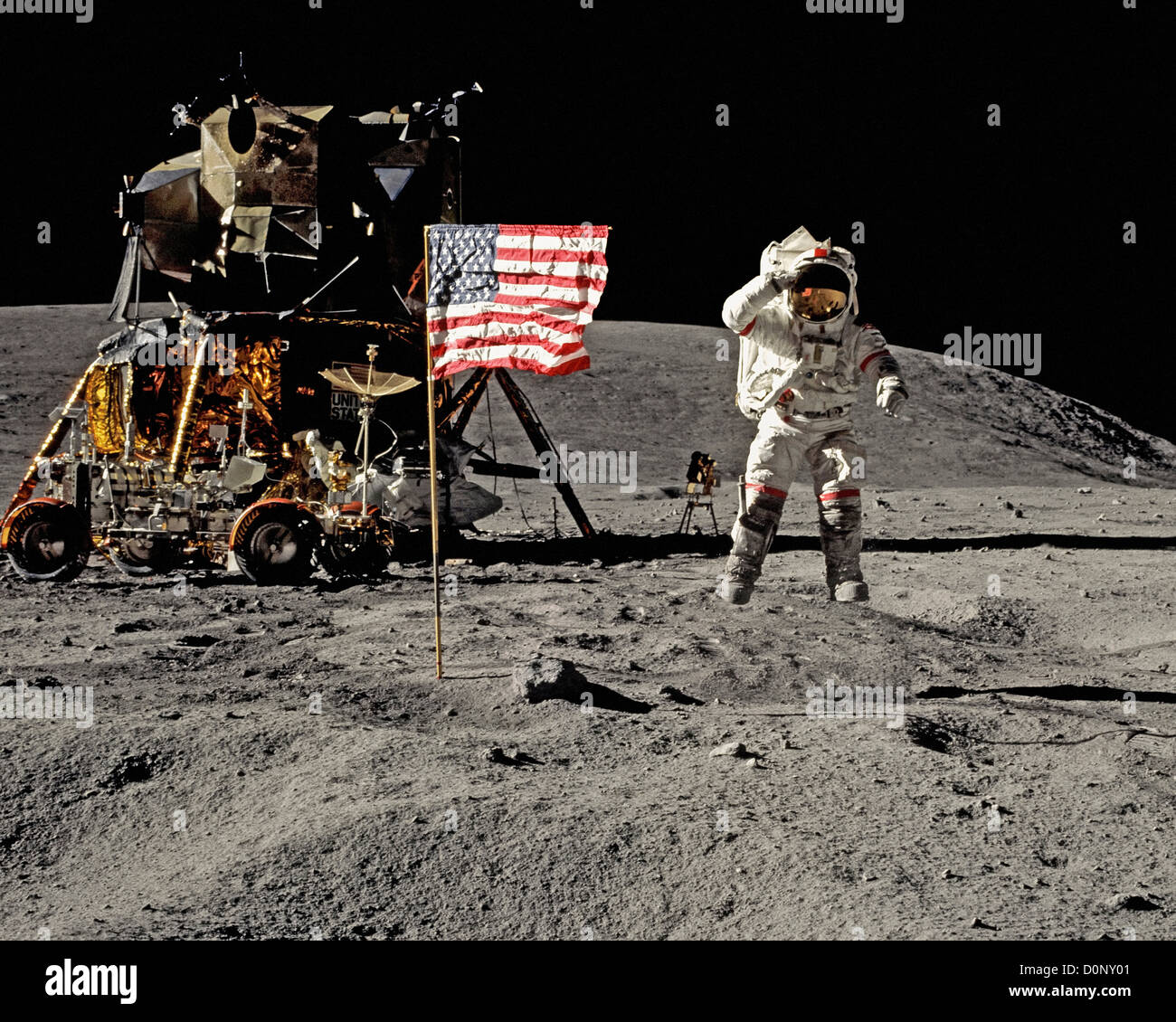 Apollo 16 Astronaut Salutes the American Flag on the Moon Stock Photo