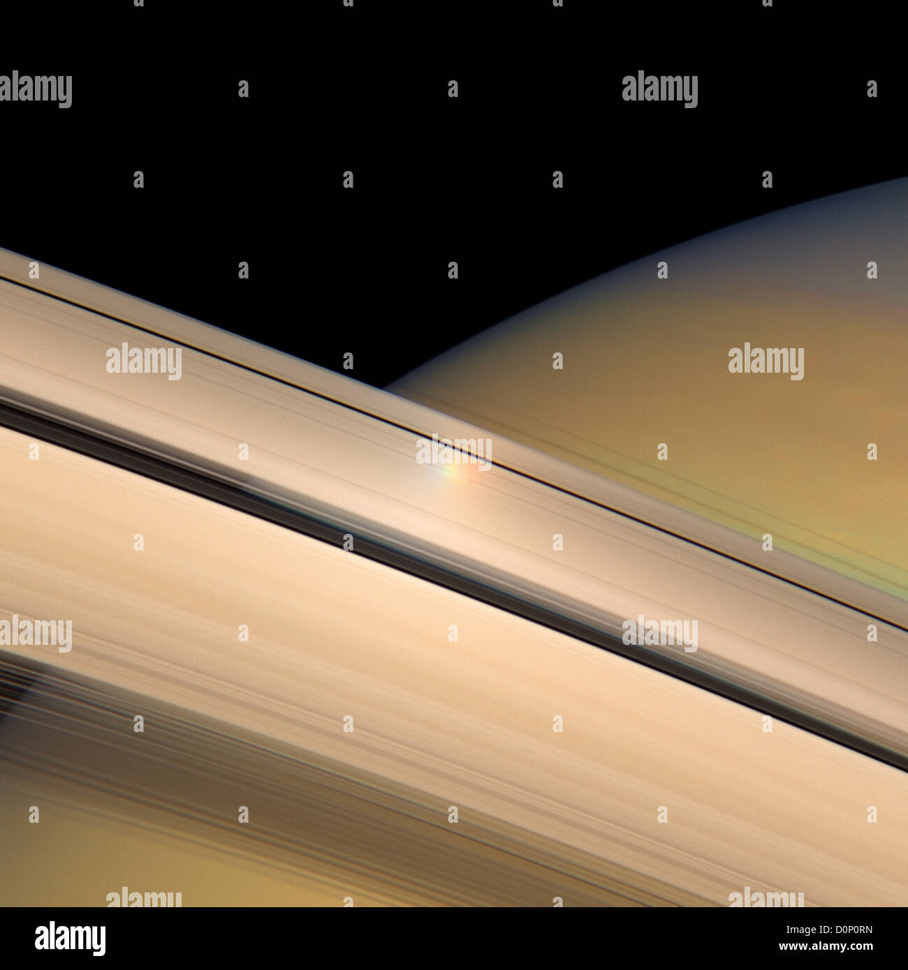 Sun's Reflection on Rings of Saturn Stock Photo