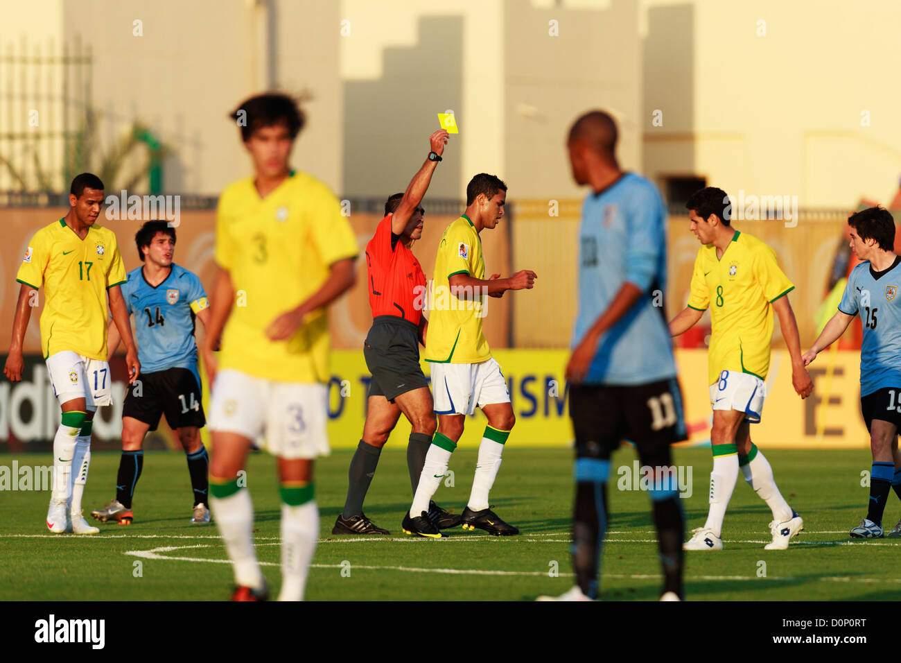 Alan Kardec of Brazil is booked by referee Marco Rodriguez (Mexico) during a 2009 FIFA U-20 World Cup round of 16 match. Stock Photo