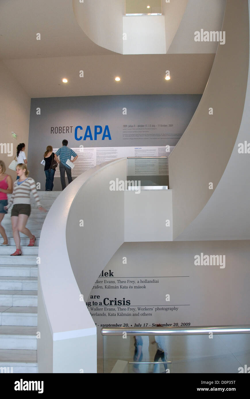 Robert Capa exhibition, visitors on stairs, Ludwig Museum, Museum of Contemporary Art, Budapest, Hungary, Europe Stock Photo
