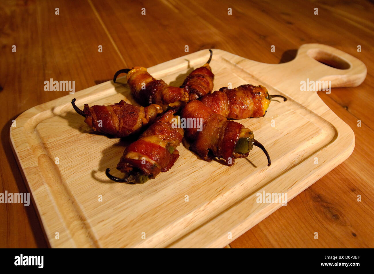 Bacon wrapped quail and jalapeno pepper appetizers Stock Photo Alamy